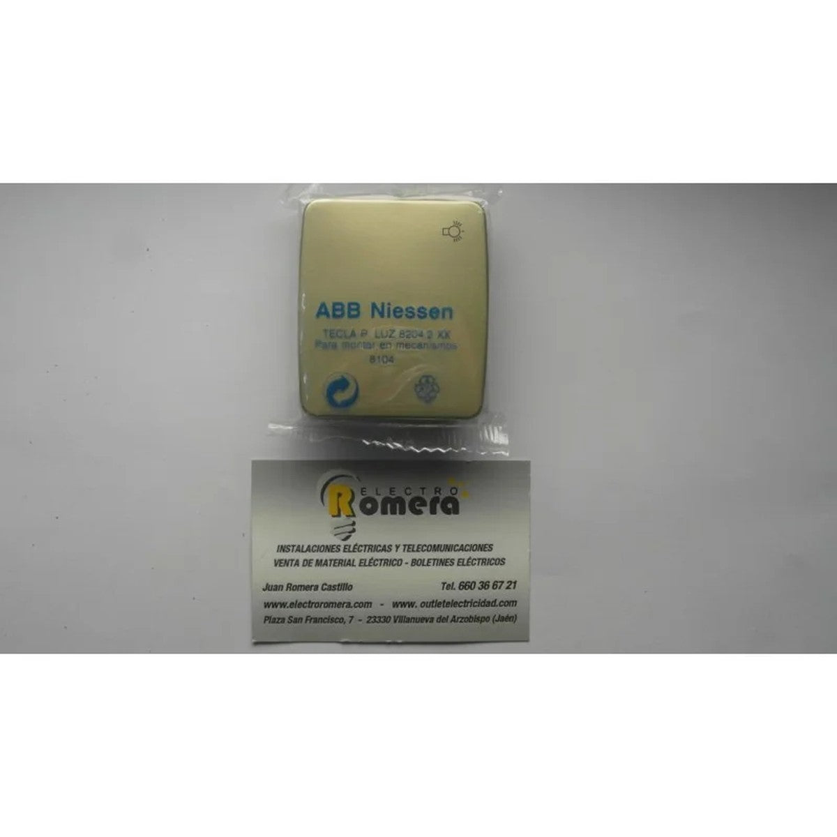 Tecla para pulsador con símbolo de luz Niessen Arco champán – Ref. 8204.2-CH